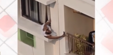 Elderly Man Hangs Out of Kolkata High-Rise Window to Watch Neighbor Dispute